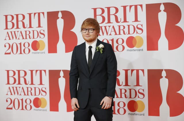 Ed Sheeran wears an engagement ring on the red carpet at the Brit Awards (Getty)