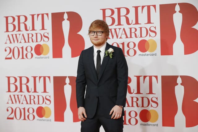 Ed Sheeran wears an engagement ring on the red carpet at the Brit Awards (Getty)