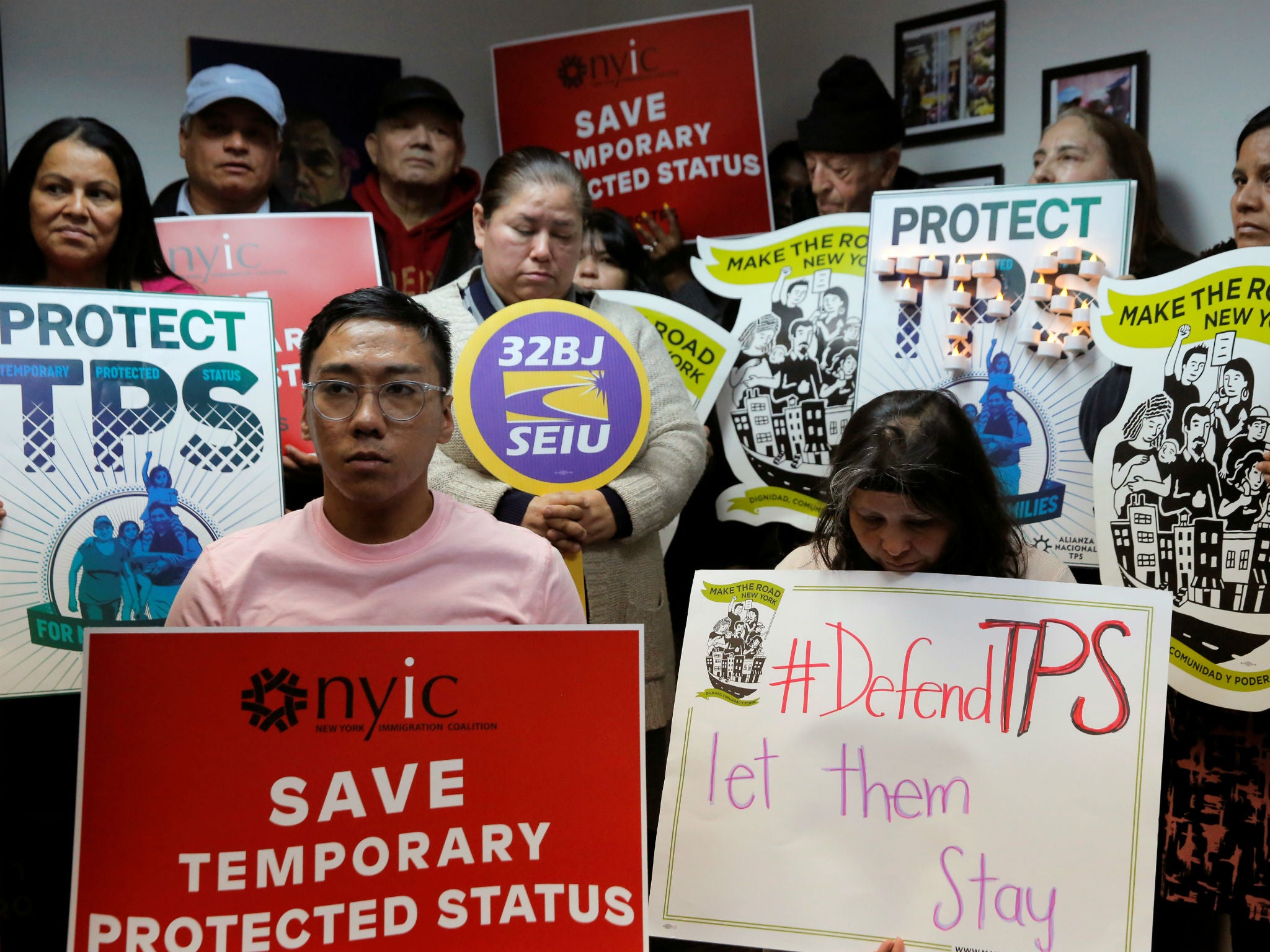 People protest the Trump administration ending Temporary Protected Status for people from El Salvador in New York City