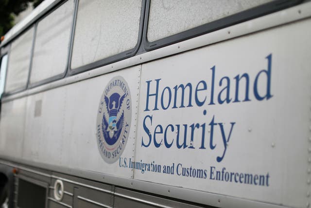 A Homeland Security Immigration and Customs Enforcement bus is seen parked outside a federal jail in San Diego, California