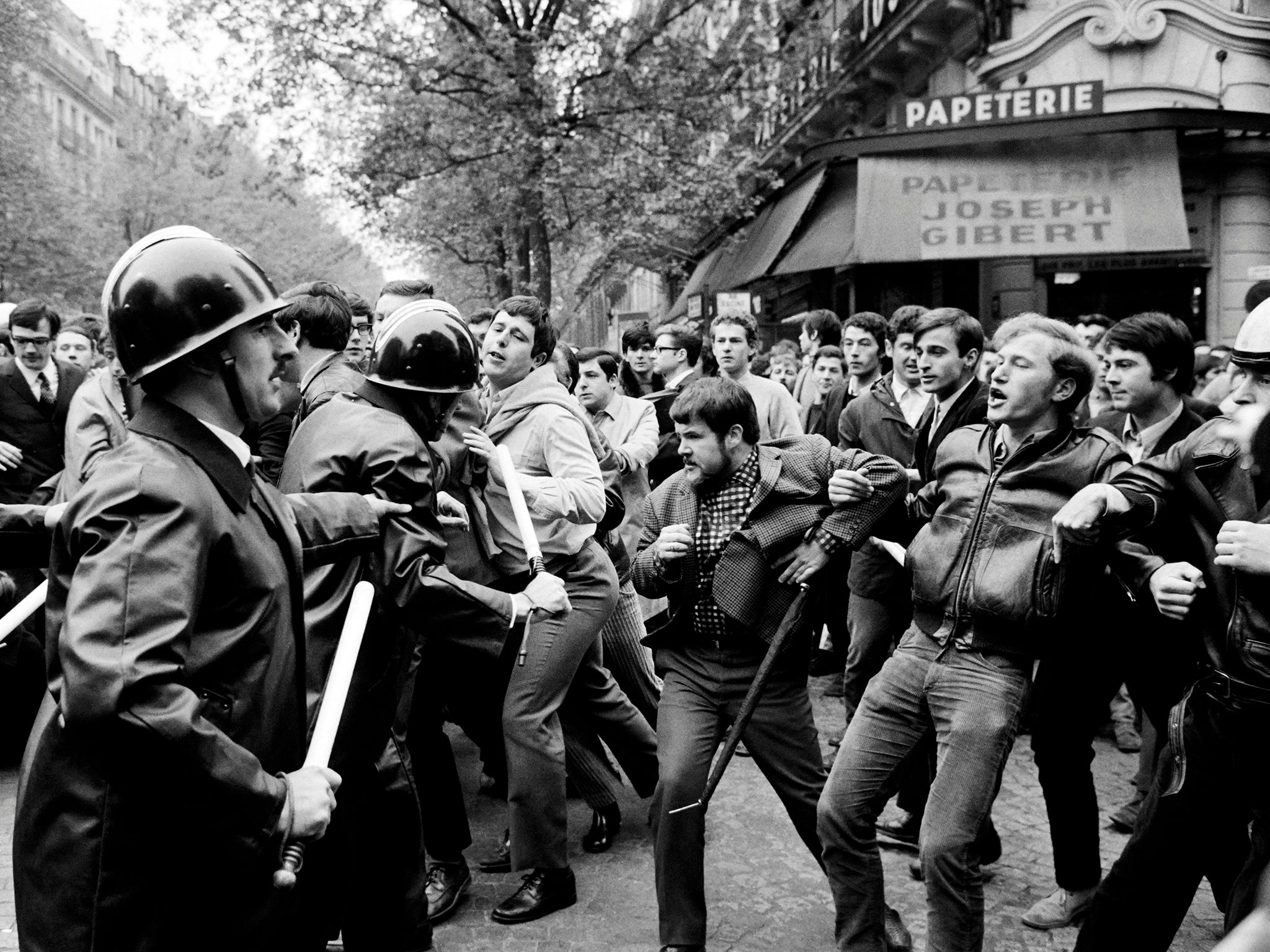 Protesters face police in front of the Joseph Gibert bookstore, Boulevard Saint Michel, in May 1968 in Paris (AFP/Getty)