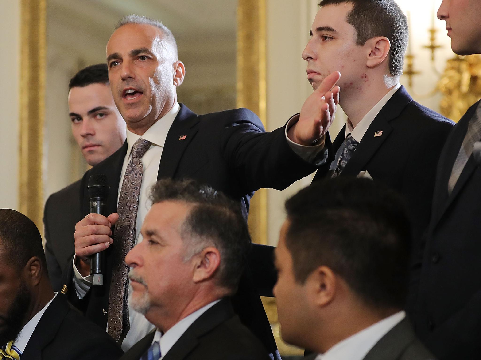 &#13;
Andrew Pollack, whose daughter Meadow was killed in the Parkland shooting, is joined by his sons as he addresses a listening session with Donald Trump in the White House on Wednesday (Getty)&#13;
