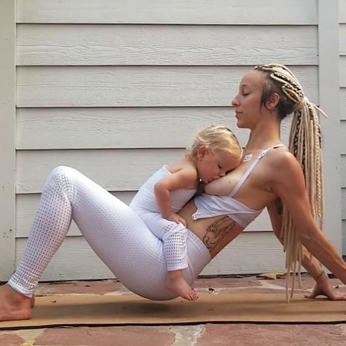 Mother criticised for breastfeeding toddler while doing yoga, The  Independent