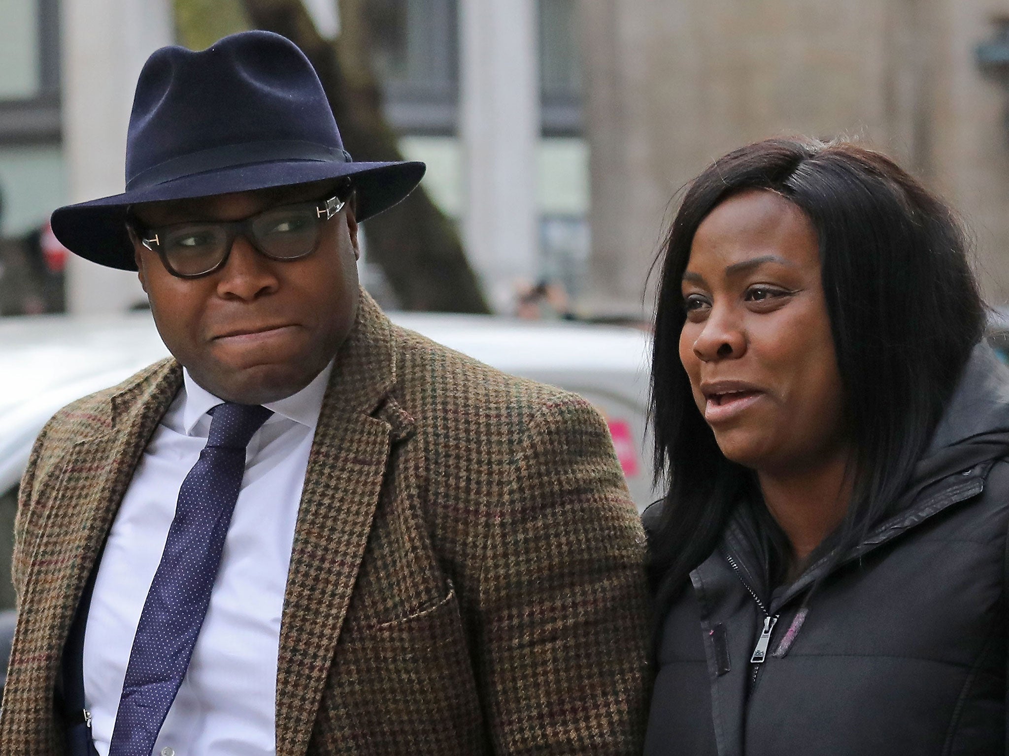 Isaiah Haastrup's mother Takesha Thomas and father Lanre Haastrup outside the High Court in London