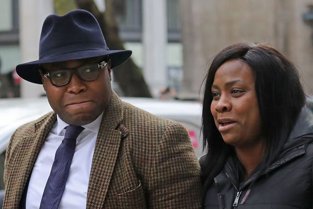 Isaiah Haastrup’s mother, Takesha Thomas, and father, Lanre Haastrup, outside the High Court in London