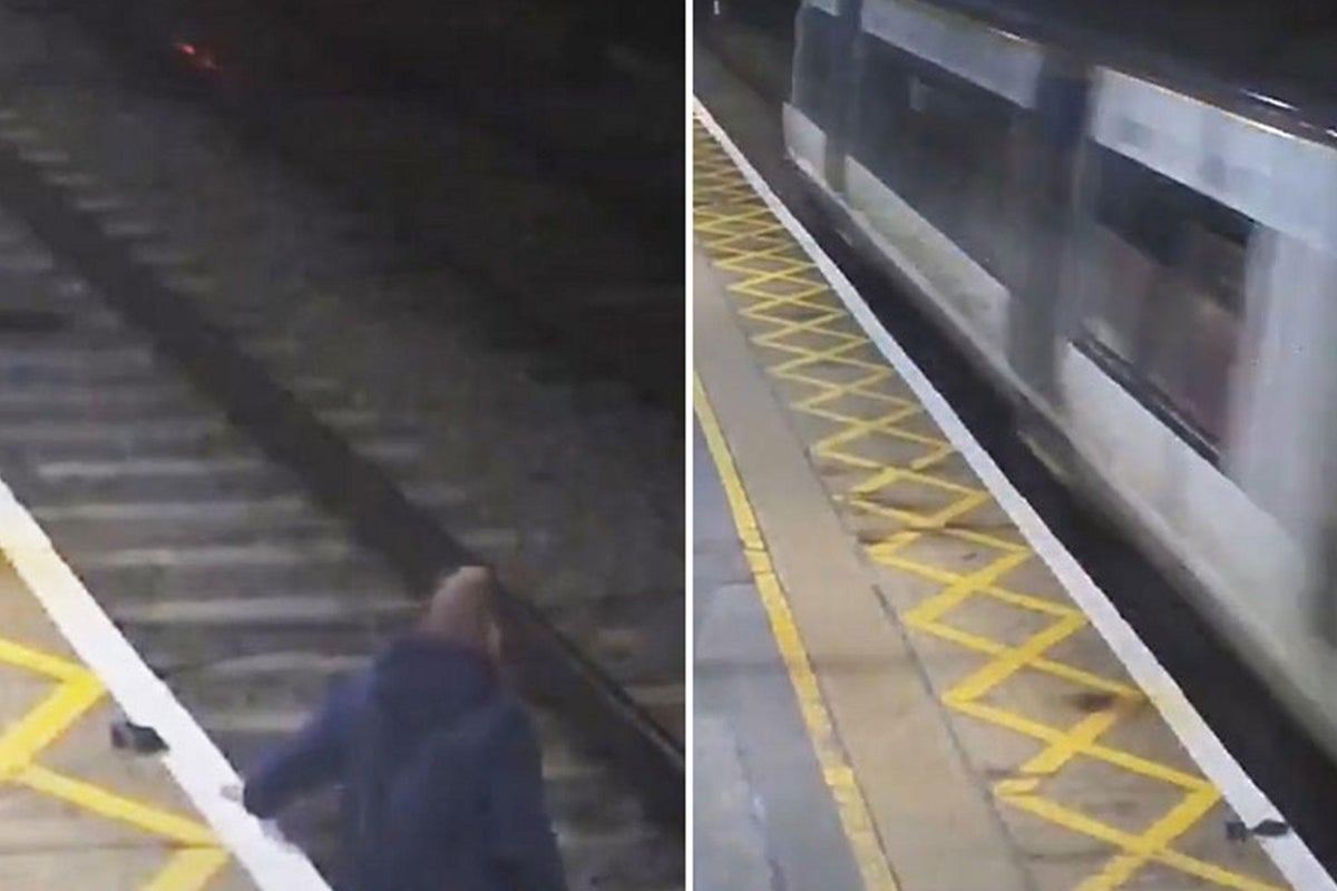CCTV shows drunk man lying on tracks before train speeds through | The ...