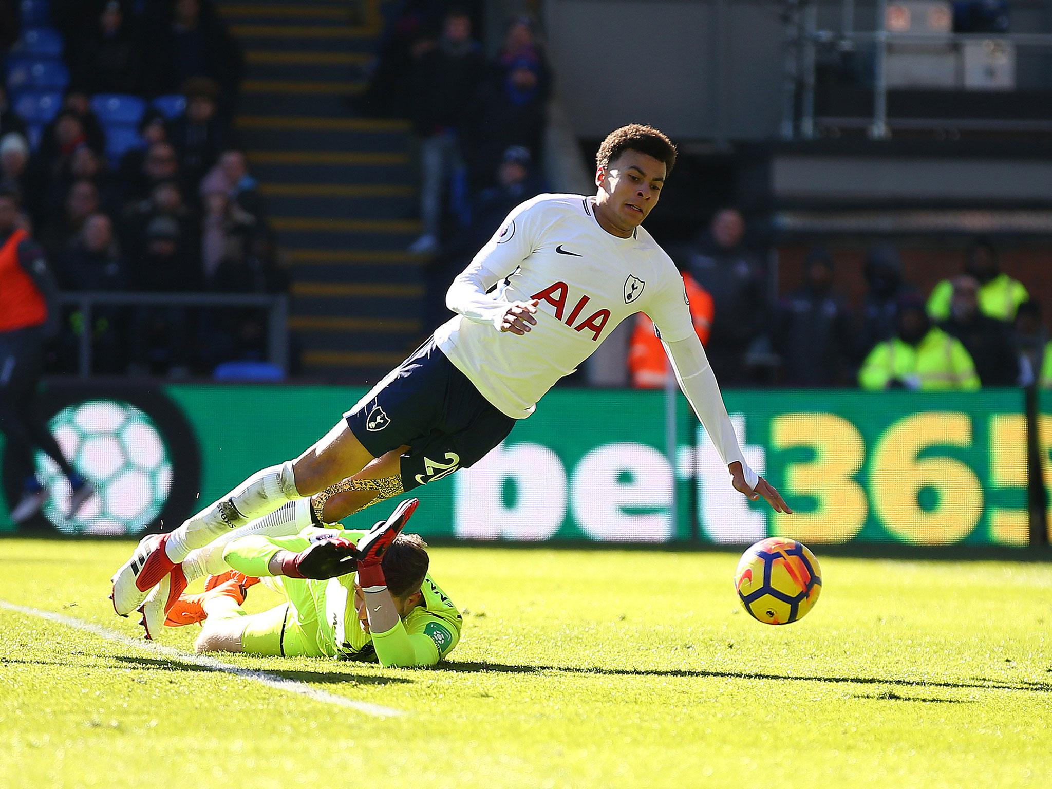 Dele Alli goes to ground in the Crystal Palace penalty area