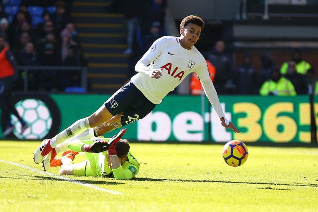 Dele Alli goes to ground in the Crystal Palace penalty area