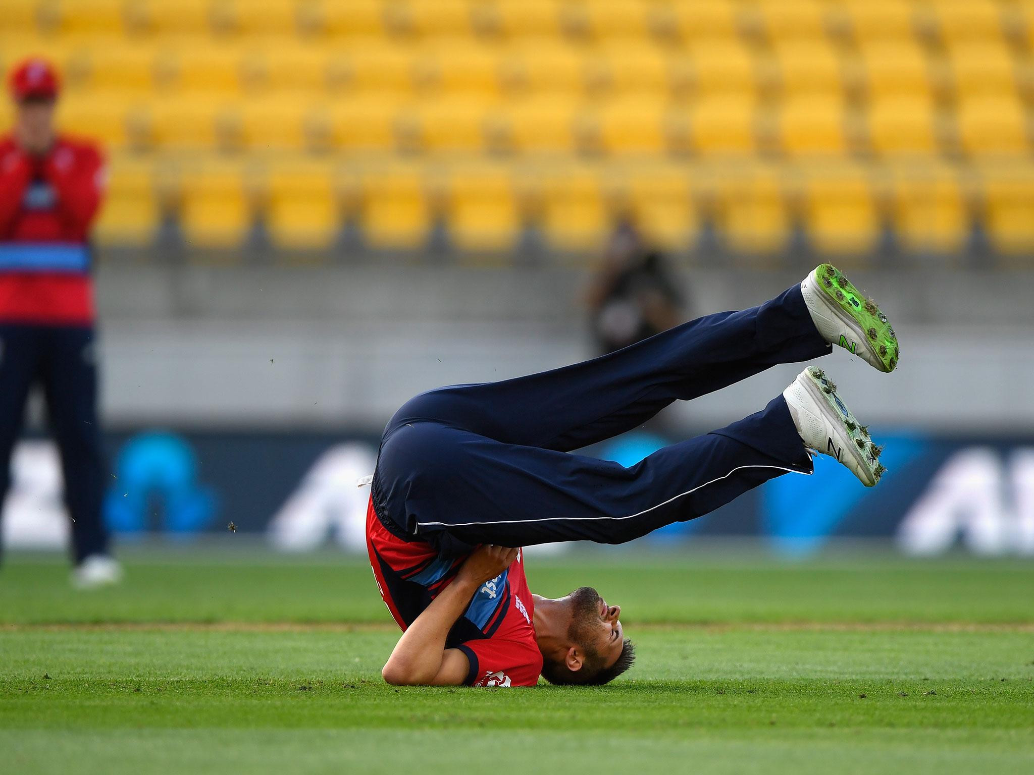 Mark Wood takes a tumble against New Zealand