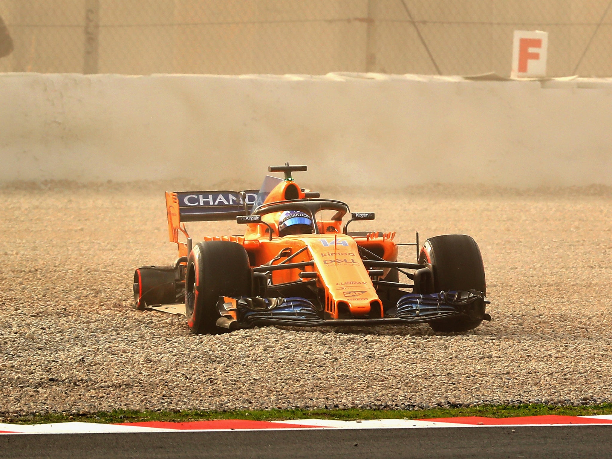 Fernando Alonso spun off the Barcelona track on only his sixth lap at the first pre-season test