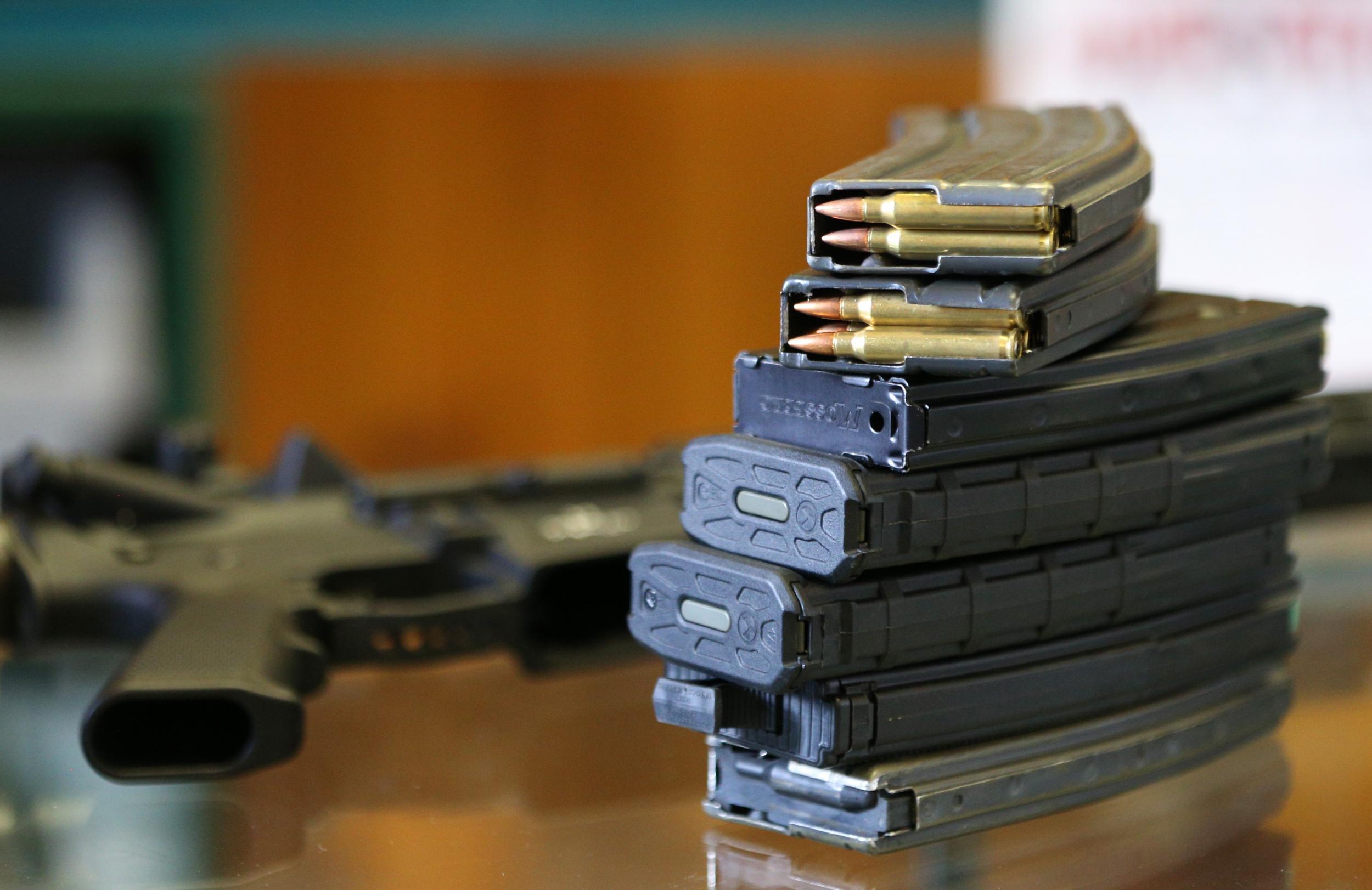 Two 30 round clips, filled with .223 cartridges and other high capacity clips for an AR-15 are shown here at Good Guys Guns & Range