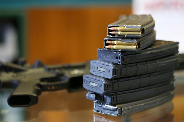 Two 30 round clips, filled with .223 cartridges and other high capacity clips for an AR-15 are shown here at Good Guys Guns & Range