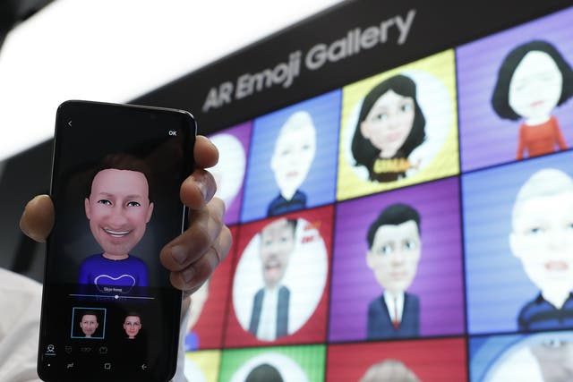 A Samsung Galaxy S9 is displayed with an AR emoji at the Samsung booth at the Mobile World Congress in Barcelona, Spain, February 26, 2018