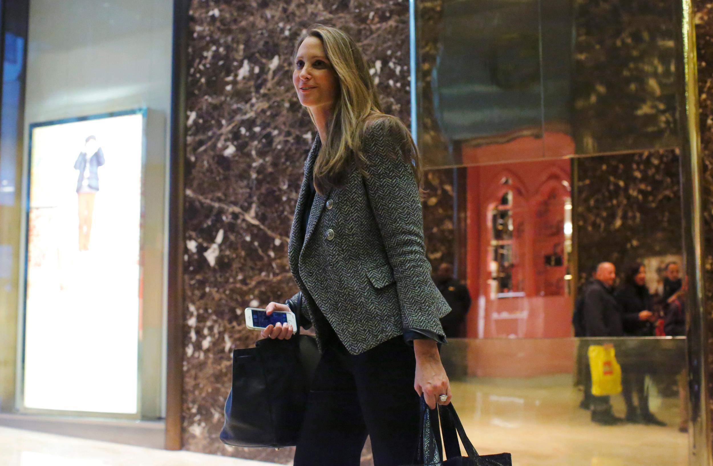 Former Vogue special event planner Stephanie Winston Wolkoff stops for a photo in front of the media at Trump Tower in New York