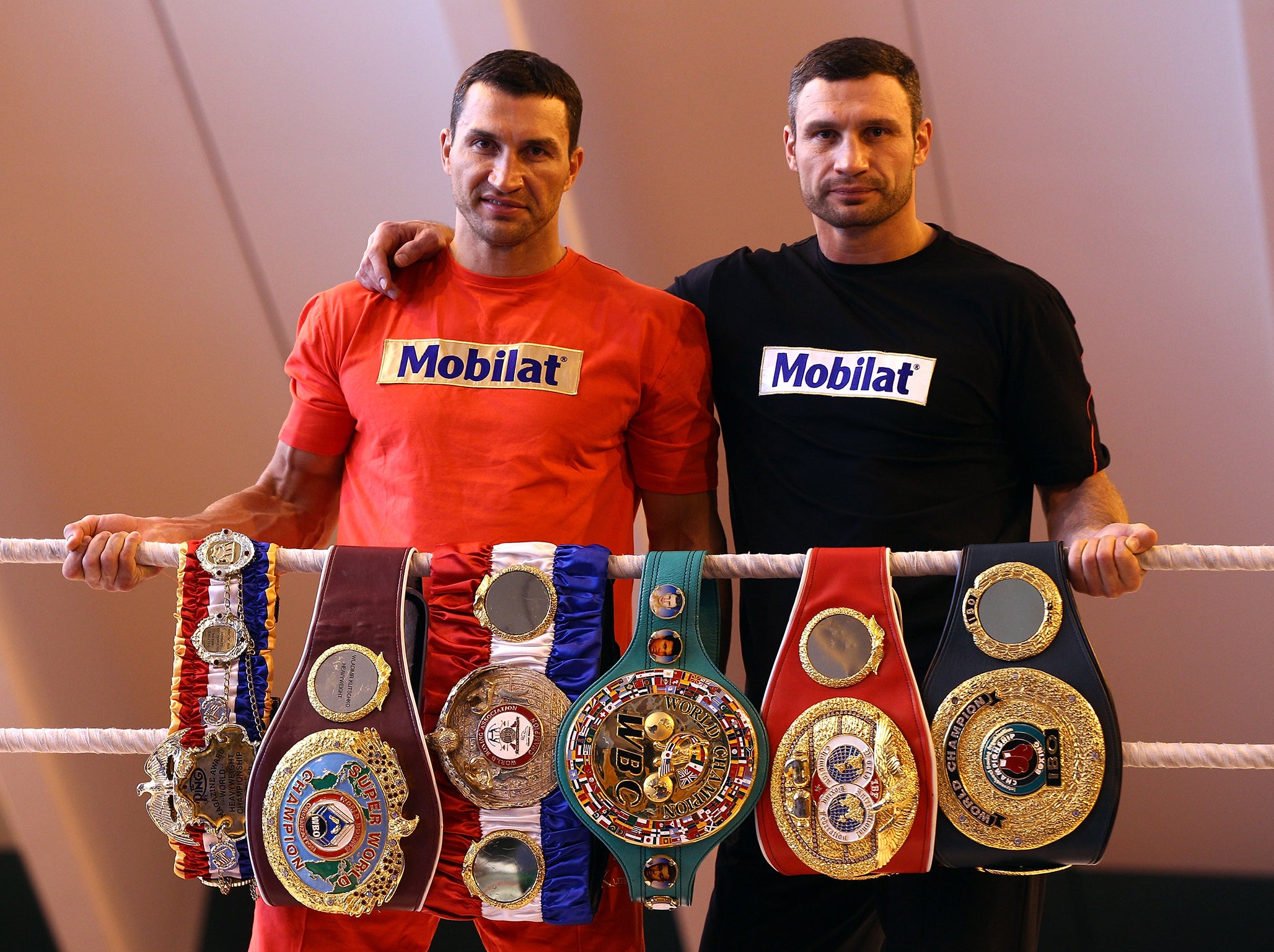 The Klitschko brothers show off their belt collection