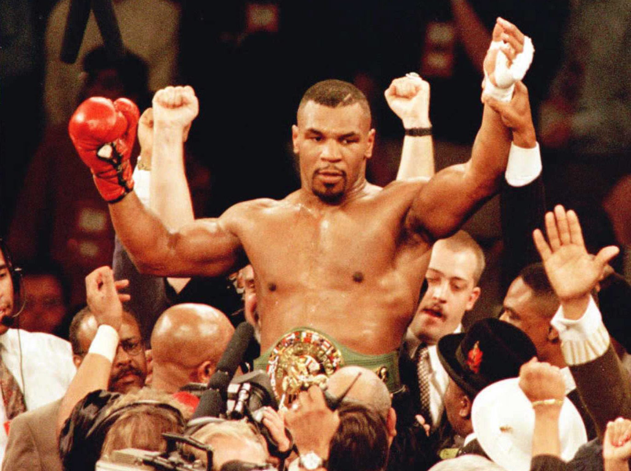 Tyson held the WBA, WBC and IBF belts