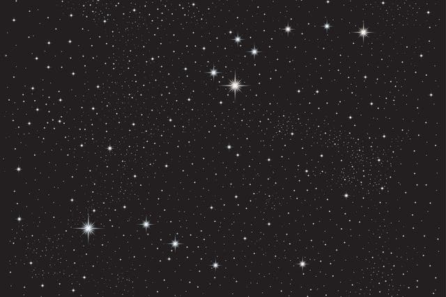 Ursa Major, containing the seven familiar stars of the Plough, rears high overhead this month