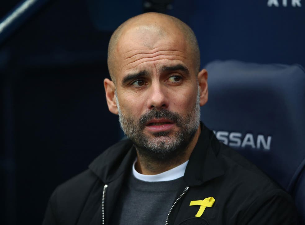 Pep Guardiola has worn the yellow ribbon during matches since October