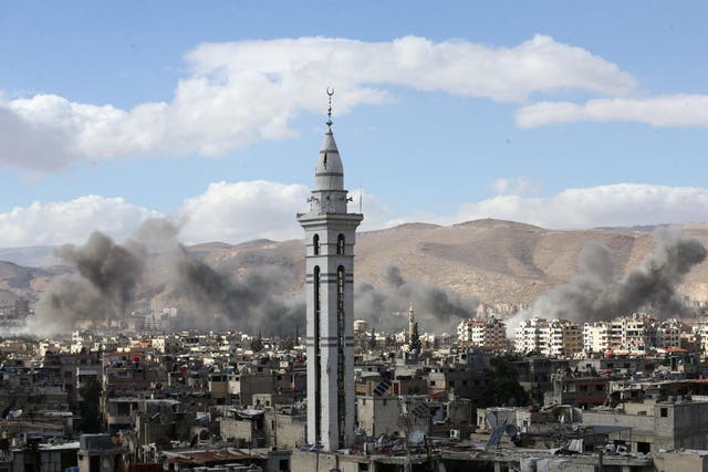Smoke rises from besieged Eastern Ghouta in Damascus, Syria, on 27 Febraury