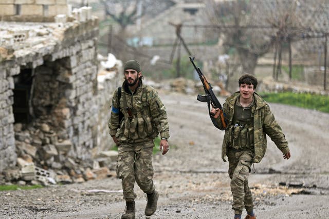 Turkish-backed fighters near the city of Afrin, Syria