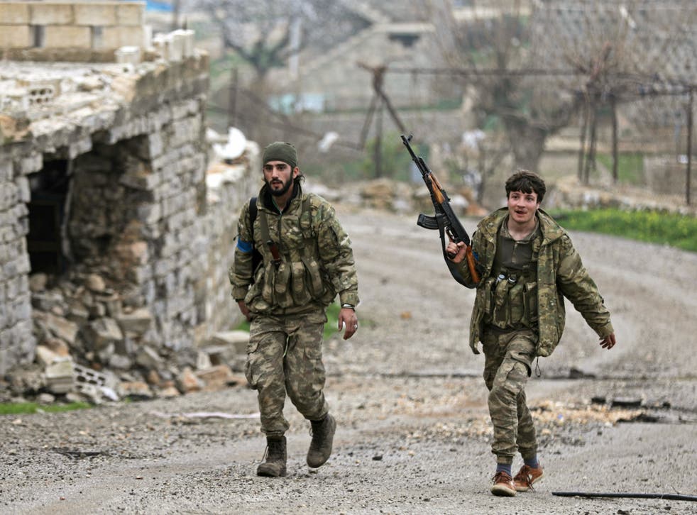 Turkish-backed fighters near the city of Afrin, Syria