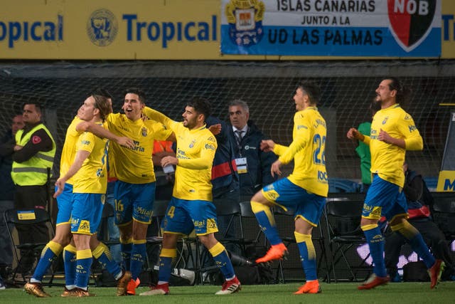 Las Palmas celebrate their controversial goal