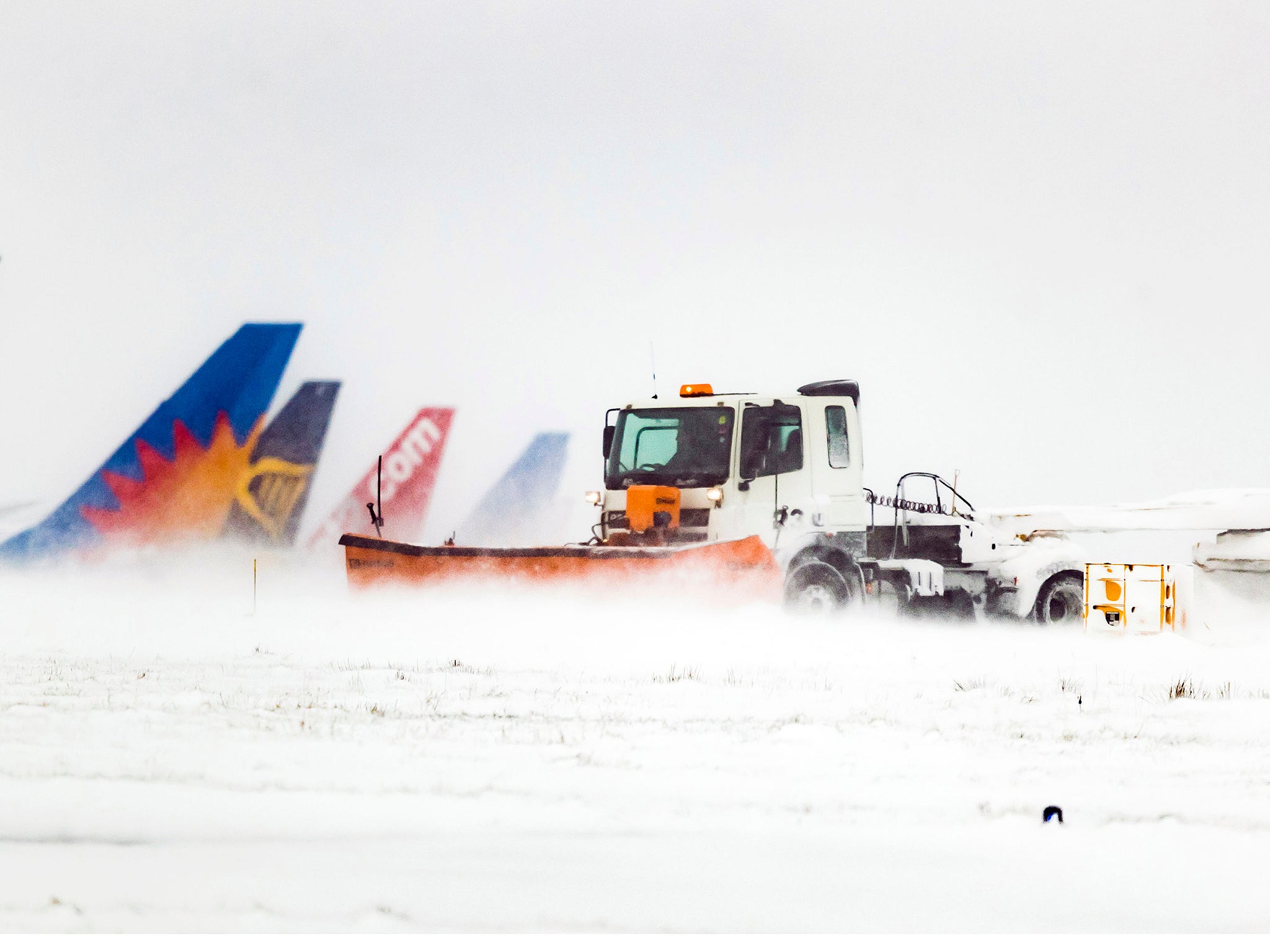 Snow is cleared at Leeds Bradford Airport in Yorkshire