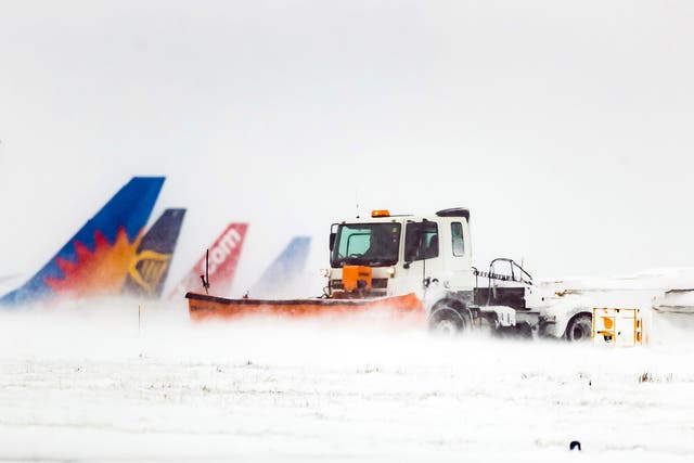 Snow is cleared at Leeds Bradford Airport in Yorkshire