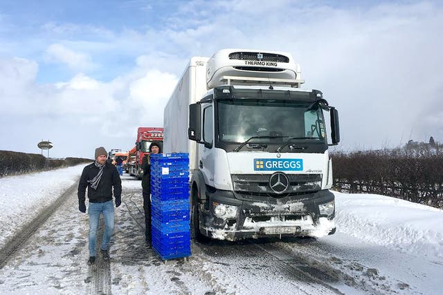 A delivery driver has been thanked for handing out cakes, pasties and doughnuts to stranded drivers on the A1