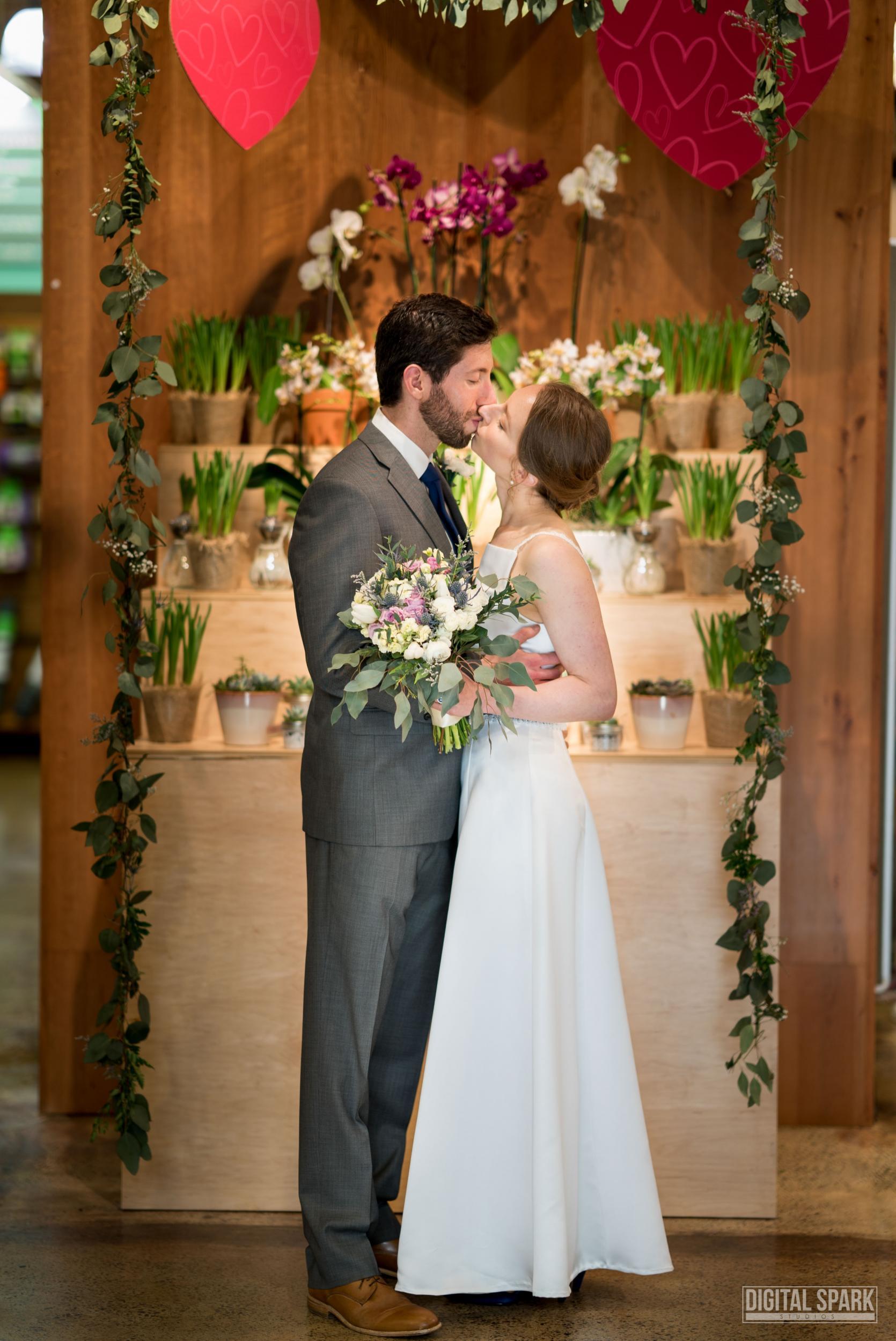 The couple exchanged vows in the flower department