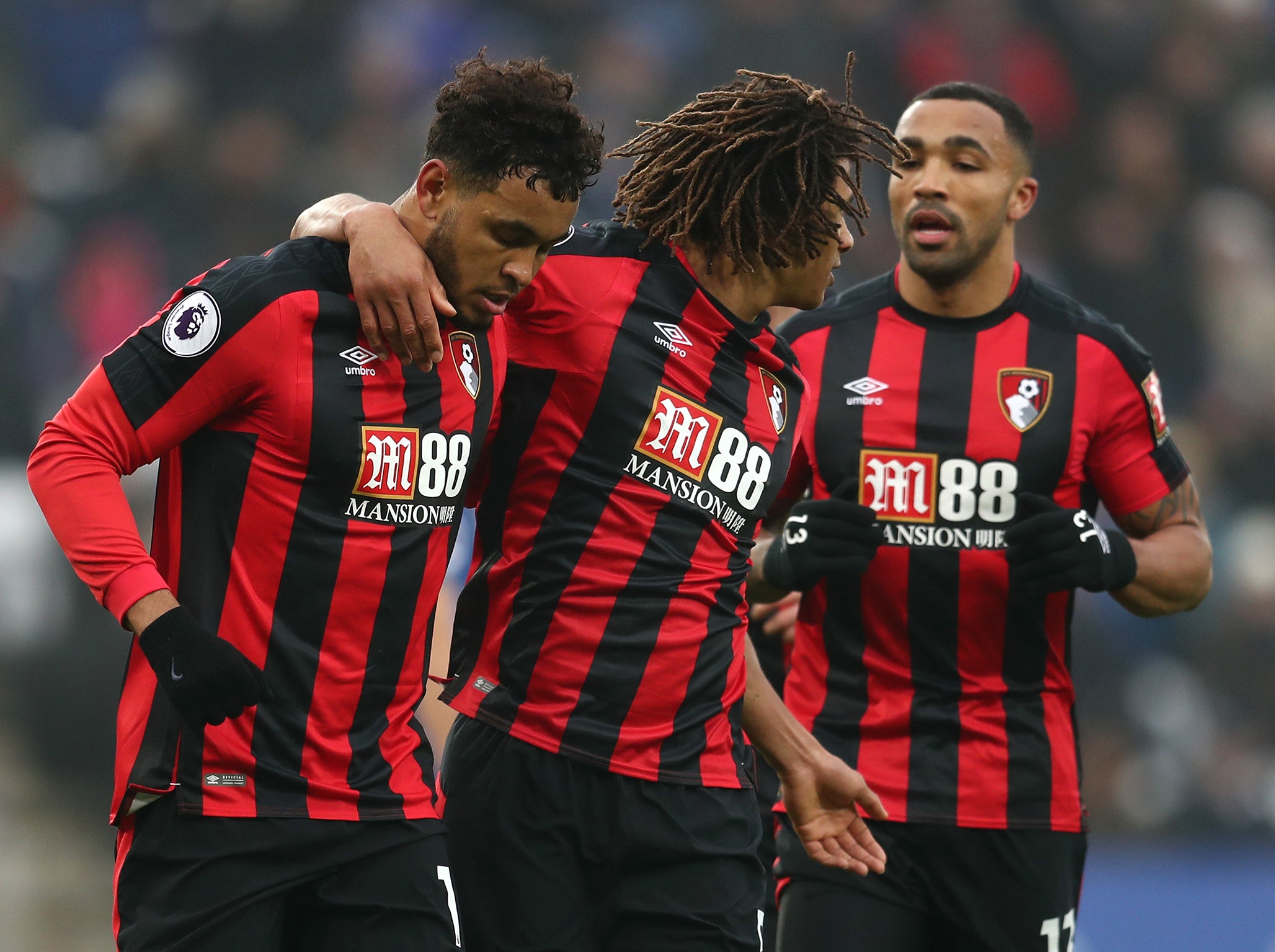 The forward is congratulated after his penalty