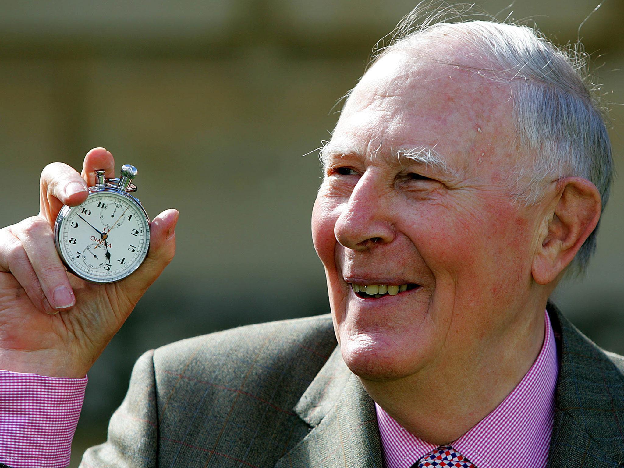 With the stopwatch used to time his historic run (Reuters/David Bebber/File Photo)