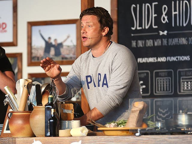 Jamie Oliver attends a cooking demonstration at the Neff Big Kitchen on day two of The Big Feastival at Alex James' Farm on August 27, 2016