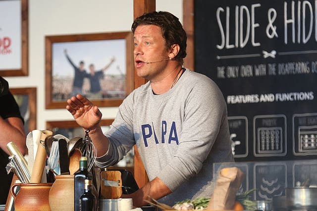 Jamie Oliver attends a cooking demonstration at the Neff Big Kitchen on day two of The Big Feastival at Alex James' Farm on August 27, 2016