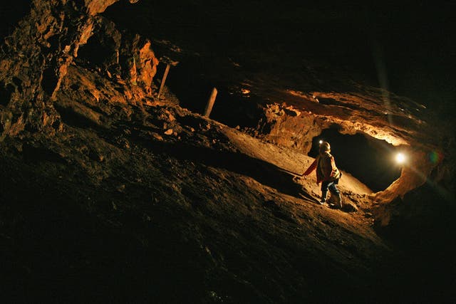 Raider of the lost art: a miner studies the ancient workings of the South Crofty mine