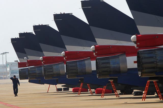 J-10 fighter jets from the 1 August aerobatics team of the People’s Liberation Army air force line up on the tarmac