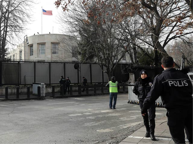 Policemen stand guard outside the US embassy in Ankara, on 5 March 2018, as part of security measures set after the embassy was closed to the public over a 'security threat'.