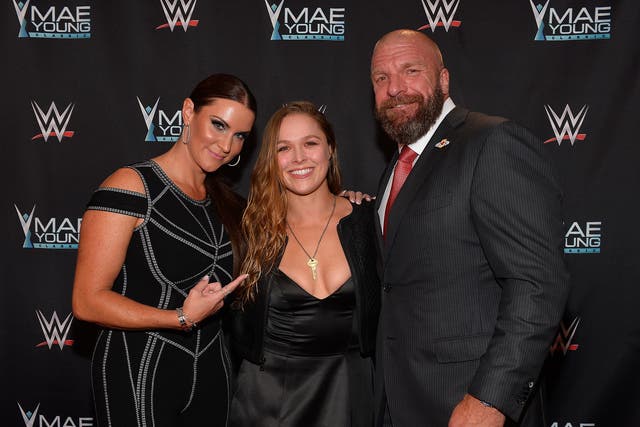 Stephanie McMahon, Ronda Rousey and Triple H