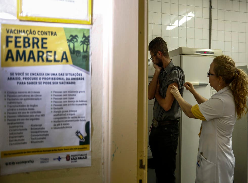As the disease closes in on Brazil’s biggest cities, officials are rushing to vaccinate 23 million people