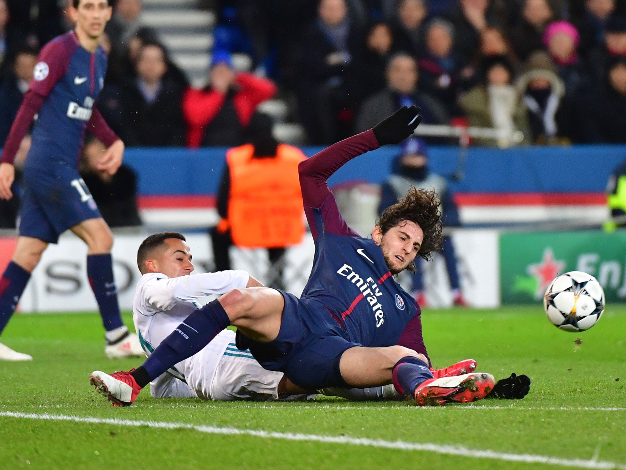 Adrien Rabiot is brought down outside the Real Madrid box