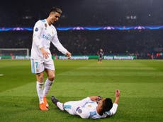 Real Madrid cruise through to Europe's last eight after downing PSG