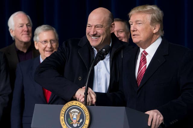 President Donald Trump shakes hands with Gary Cohn during a Republican retreat earlier this year
