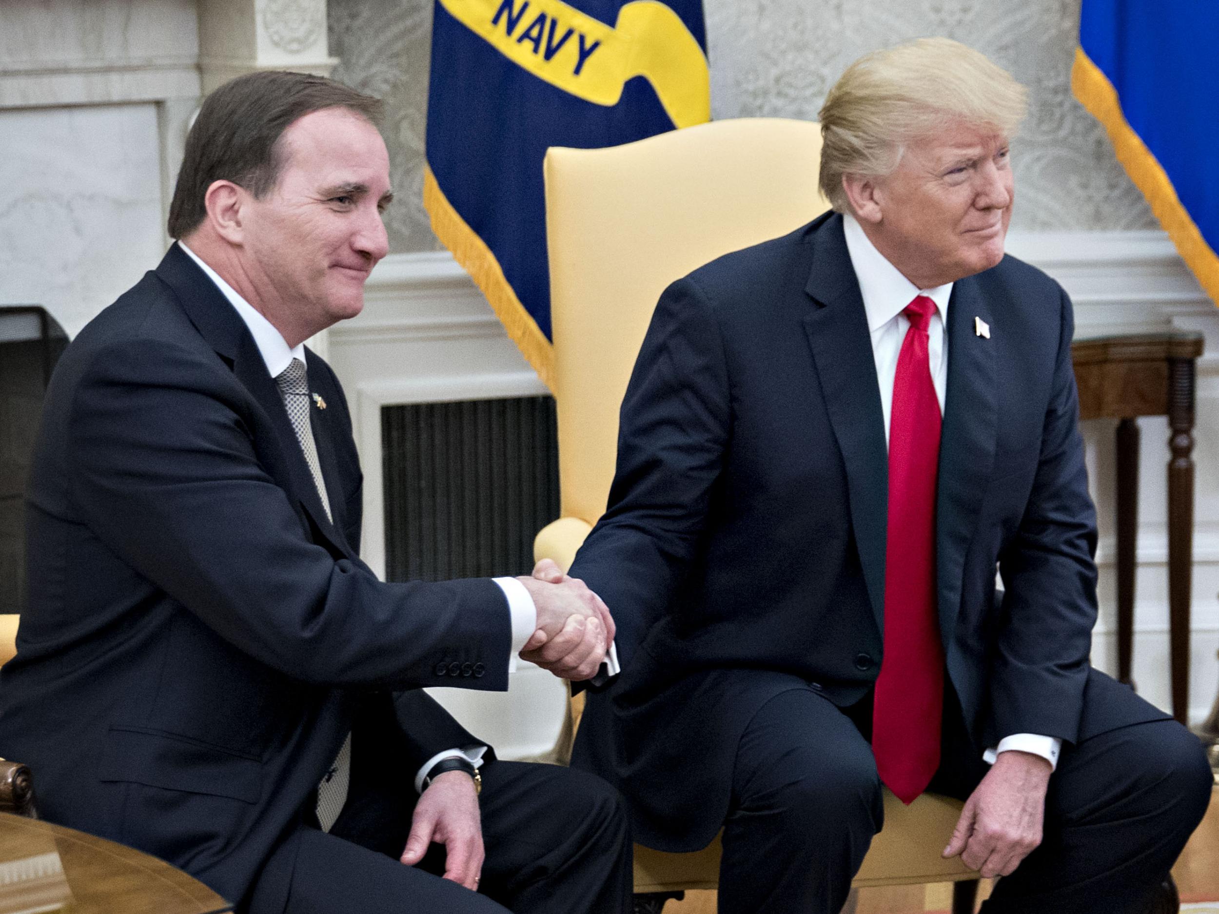 Donald Trump, right, shakes hands with Stefan Lofven, Sweden's prime minister, during a meeting in the Oval Office of the White House March 6, 2018