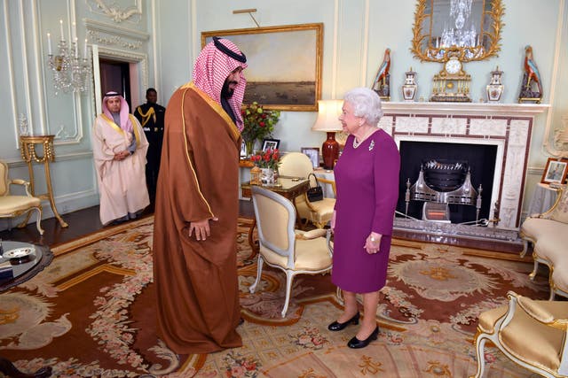 Queen Elizabeth II greets Mohammad bin Salman, the Crown Prince of Saudi Arabia, during a private audience at Buckingham Palace in London on 7 March 2018