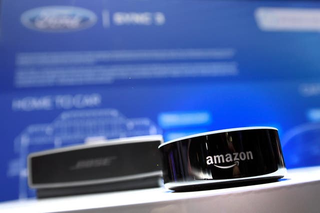 An Amazon Echo device is displayed at the Ford booth at CES 2017 at the Las Vegas Convention Center on January 5, 2017 in Las Vegas, Nevada