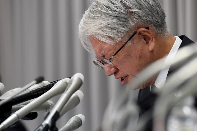 Kobe Steel chief Hiroya Kawasaki shows his anguish during a press conference in Tokyo