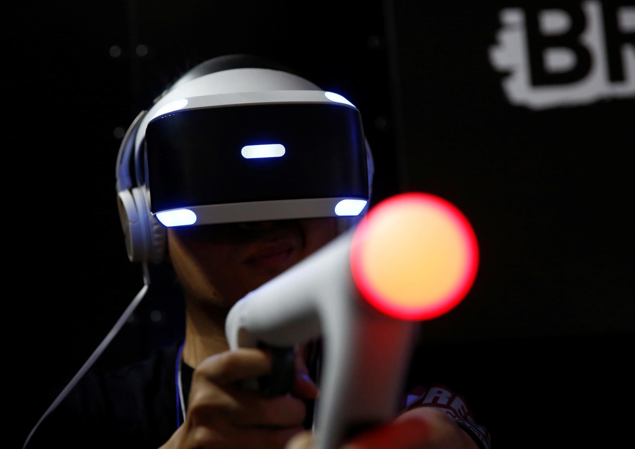 A man tries Sony Interactive Entertainment's Bravo Team at Tokyo Game Show 2017 in Chiba, east of Tokyo, Japan, September 21, 2017