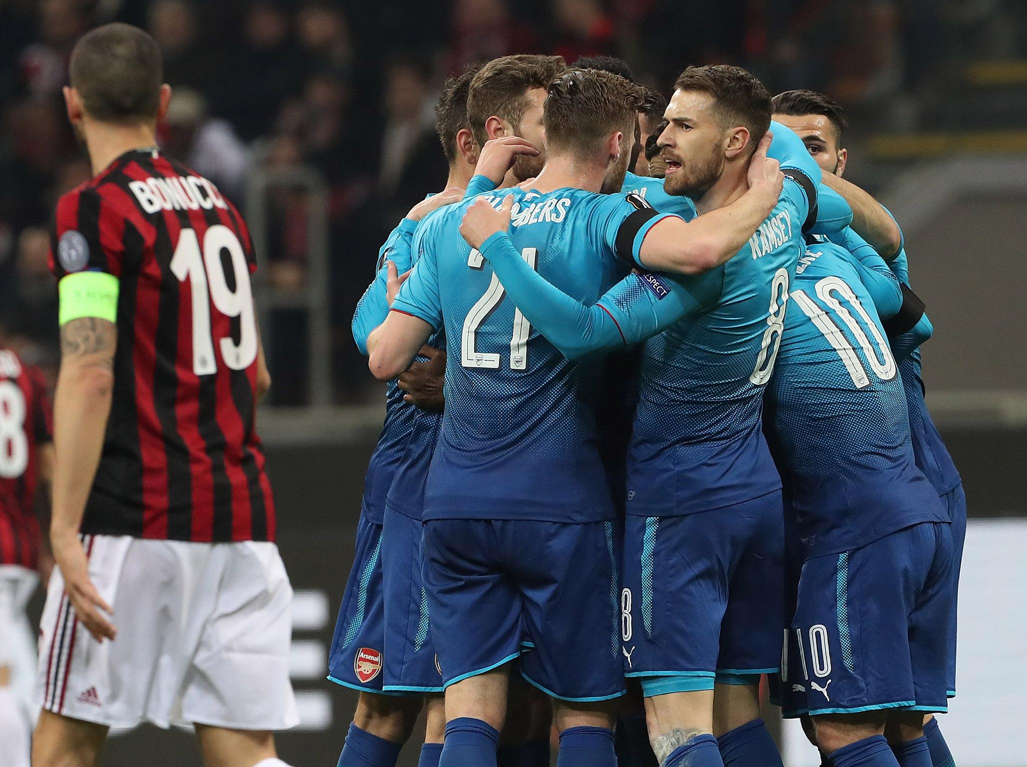 Arsenal celebrate the opener as a team