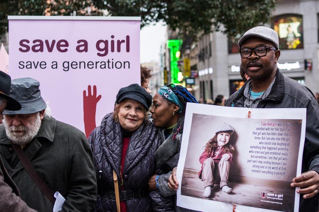 People protesting during the International Day Against Female Genital Mutilation in Madrid, Spain