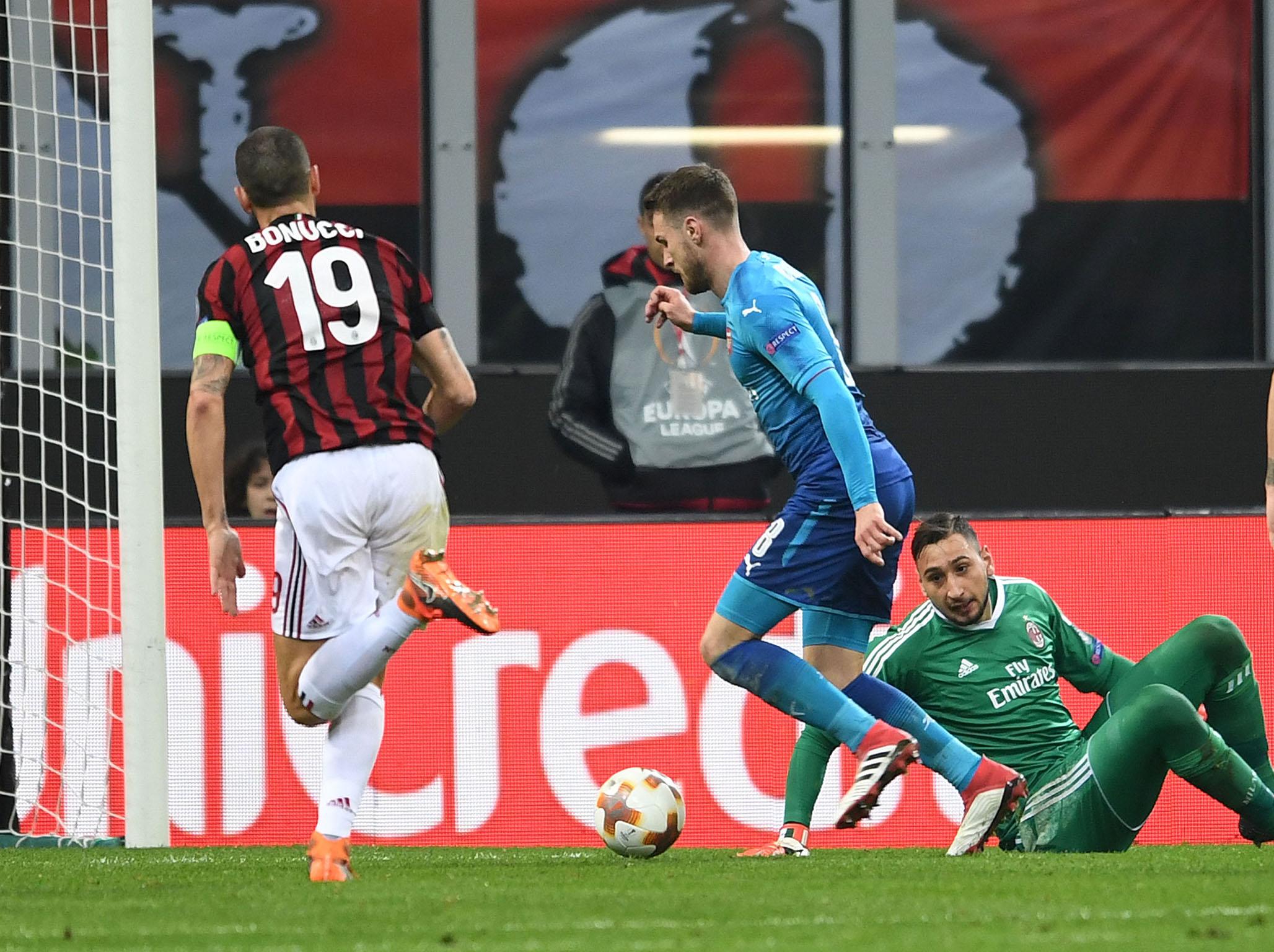 Aaron Ramsey rounds the goalkeeper to score (Getty Images)